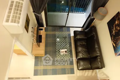 Modern living room with leather sofa and balcony view in stylish apartment