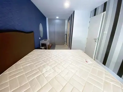 Modern bedroom with stylish decor and spacious layout