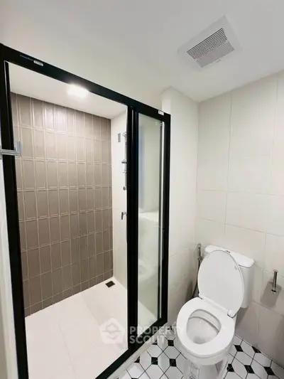 Modern bathroom with sleek shower and stylish tile flooring