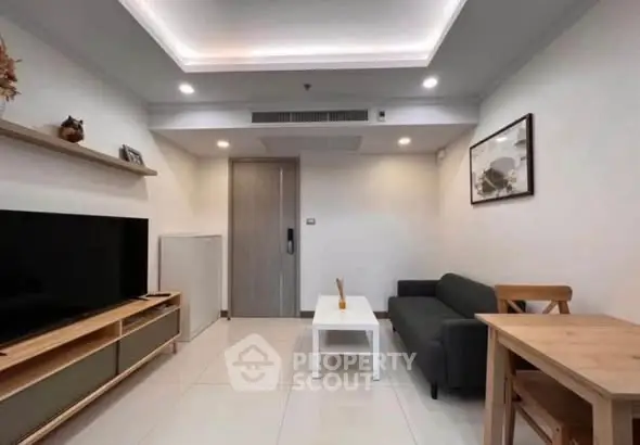 Modern living room with sleek furniture and ambient lighting