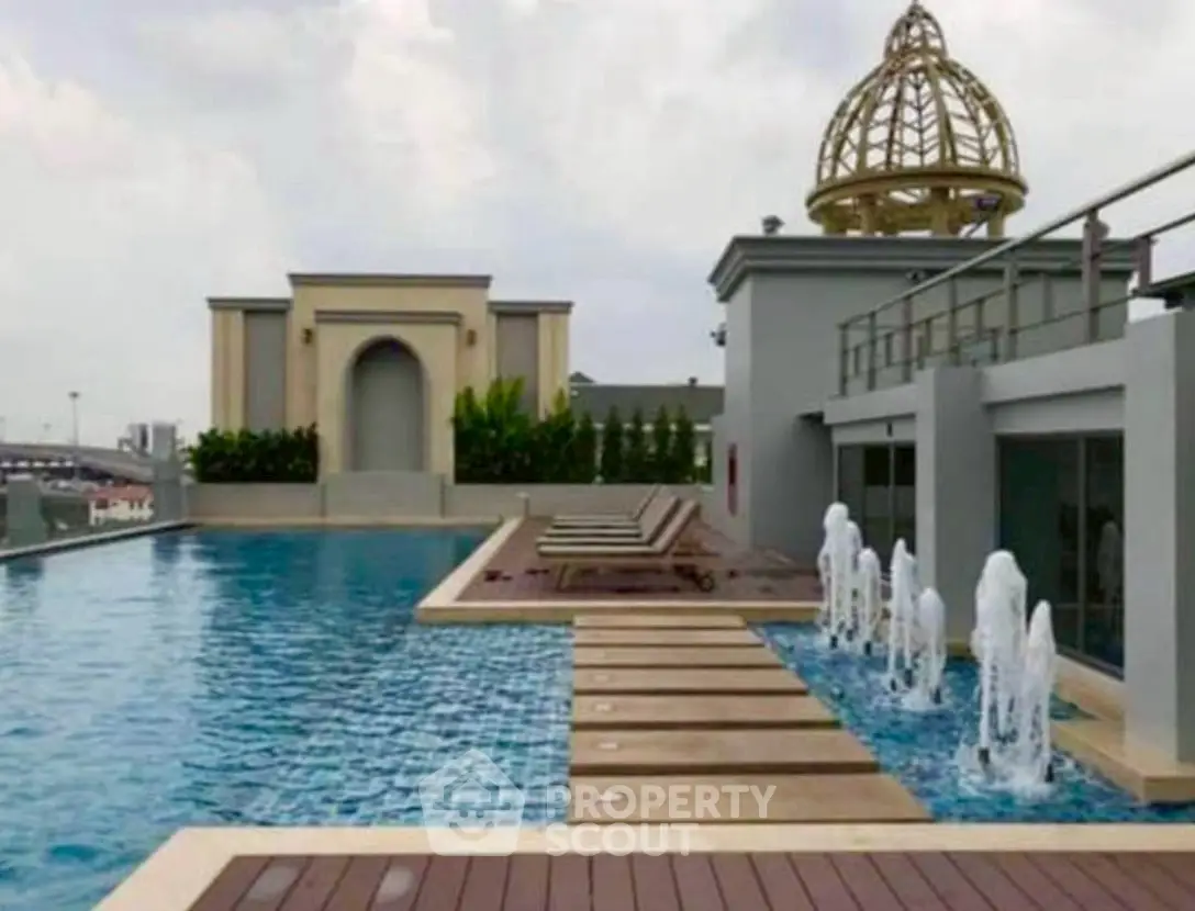 Luxurious rooftop pool with elegant architectural features and fountains
