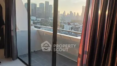 Modern balcony with stunning city skyline view at sunset