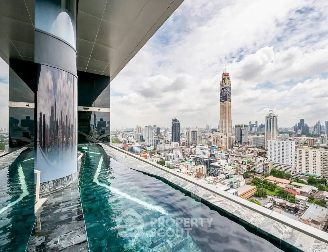 Stunning rooftop pool with panoramic city skyline view