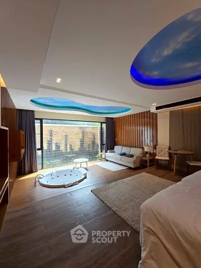 Luxurious bedroom with unique ceiling design and in-room jacuzzi, offering a serene retreat.