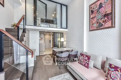 Modern duplex living room with stylish decor and open layout
