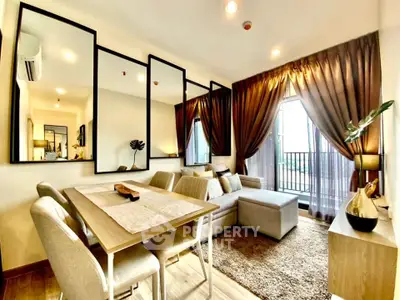 Stylish modern living room with elegant decor and large windows for natural light.