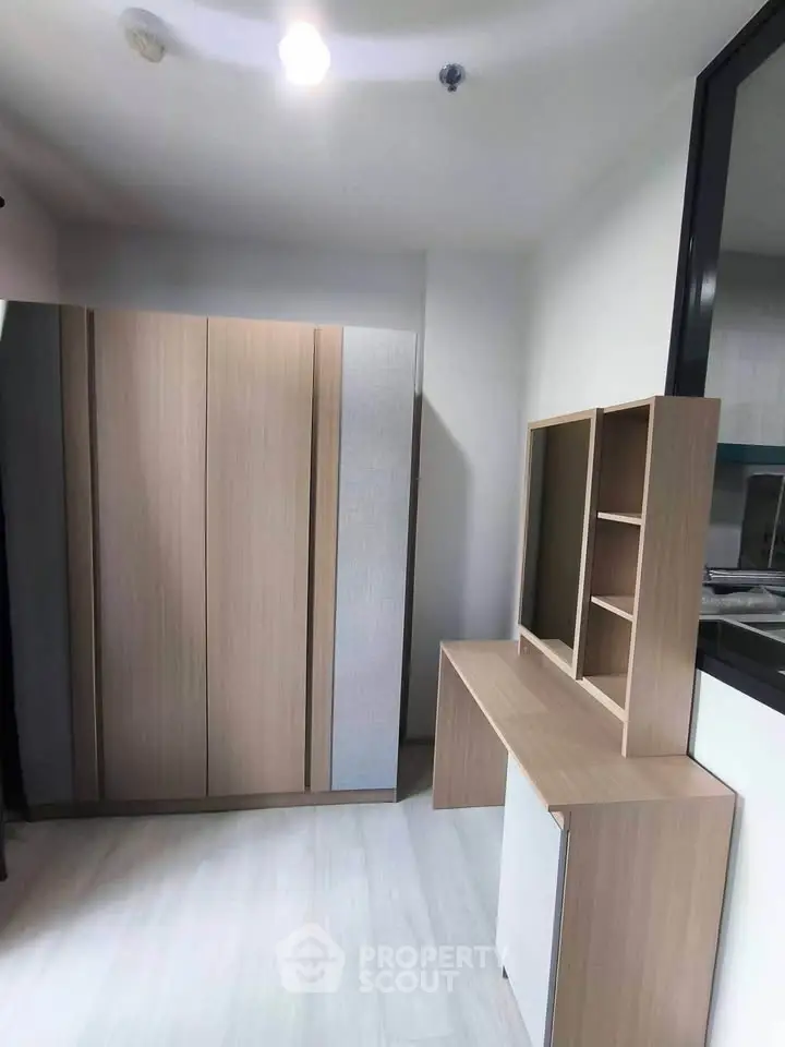 Modern study room with sleek wooden furniture and ample storage space