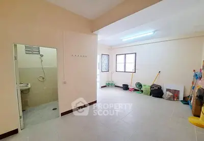 Spacious unfurnished room with attached bathroom, ideal for customization and personal touch.