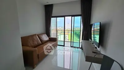 Modern living room with sleek furniture and balcony view