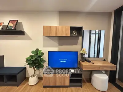 Modern living room with stylish wooden furniture and TV setup