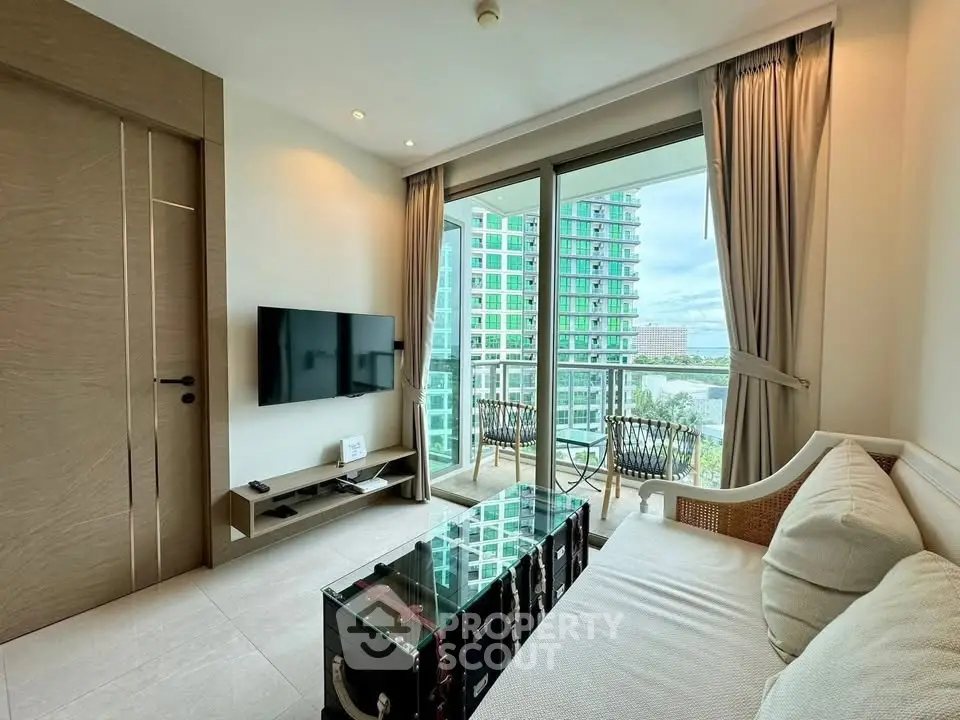 Modern living room with balcony view in high-rise apartment
