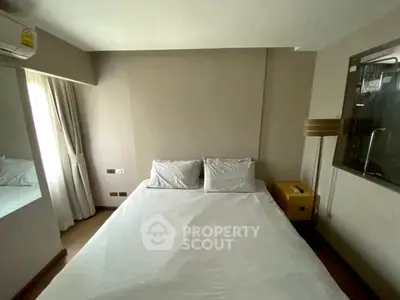Cozy bedroom with modern decor and natural light