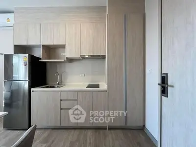 Modern kitchen with sleek cabinetry and stainless steel appliances
