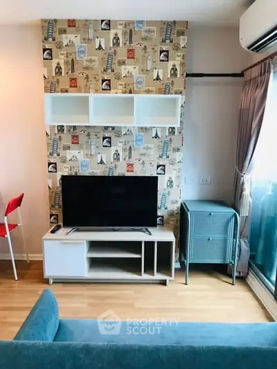 Charming living room with stylish wallpaper and modern TV setup