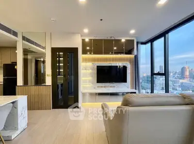Luxurious modern living room with city view, featuring sleek design and large windows.