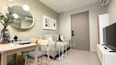 Modern living room with cozy seating and stylish decor