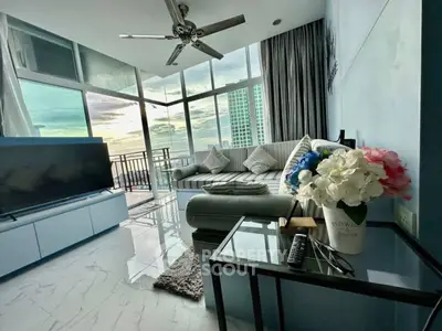 Luxurious living room with panoramic city view and modern decor