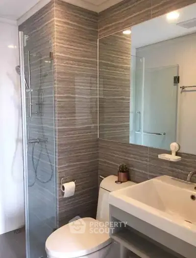 Modern bathroom with sleek design and glass shower enclosure