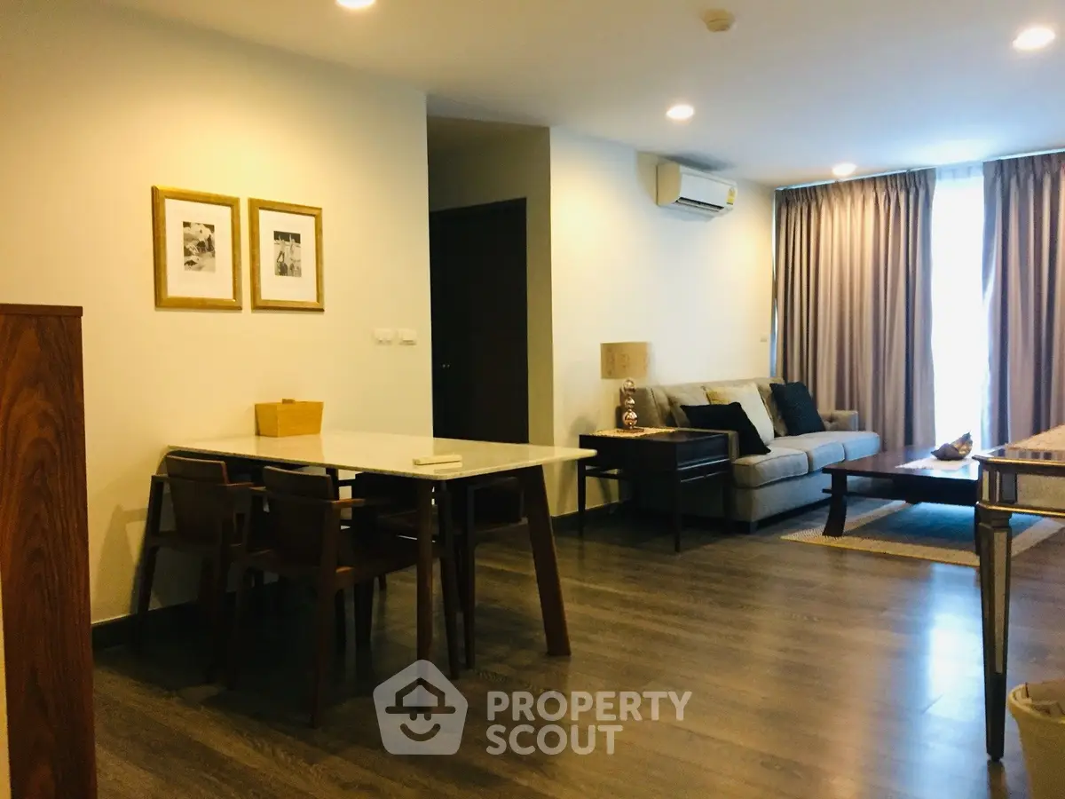 Spacious modern living room with elegant decor and natural lighting