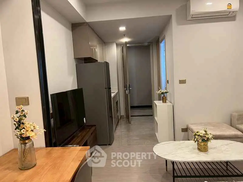 Modern living room with sleek furniture and air conditioning