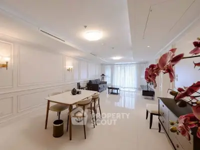 Spacious and elegant living room with modern decor and natural light