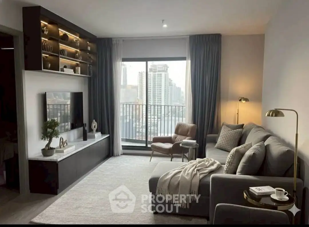 Modern living room with city view, cozy sofa, and elegant decor