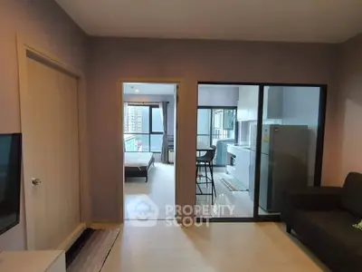 Modern apartment interior with open kitchen and cozy living area