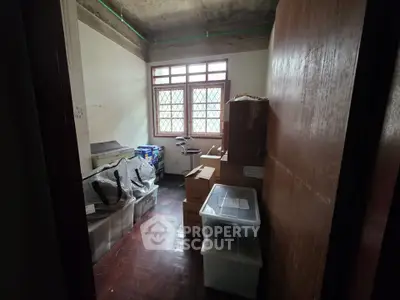 Cozy storage room with natural light and ample space for organization.