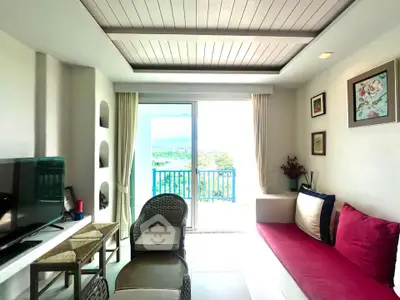 Bright living room with modern decor and stunning balcony view