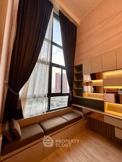 Luxurious high-rise apartment with floor-to-ceiling windows and elegant built-in seating area.