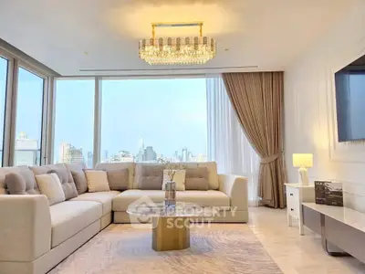 Luxurious living room with panoramic city view, elegant chandelier, and plush seating in a high-rise apartment.