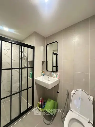 Modern bathroom with sleek shower and contemporary fixtures