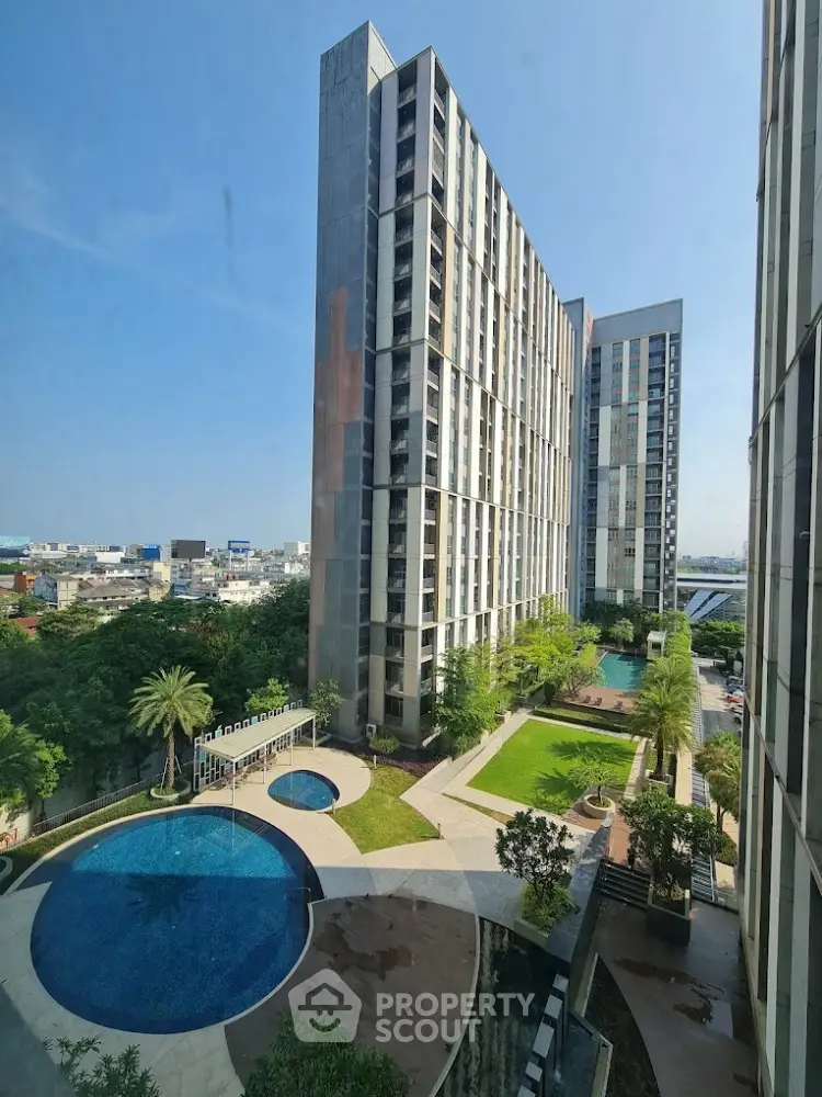 Luxurious high-rise apartment with stunning pool and garden view