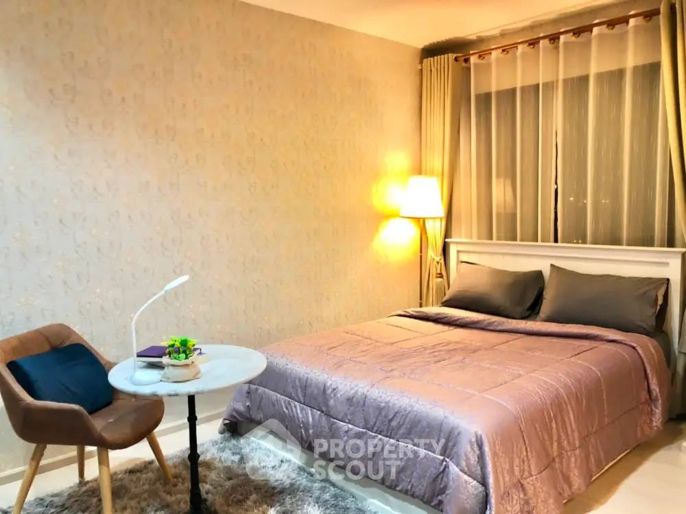 Cozy bedroom with elegant decor and ambient lighting
