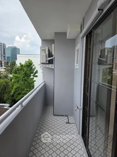 Modern balcony with city view and sleek design, perfect for urban living.