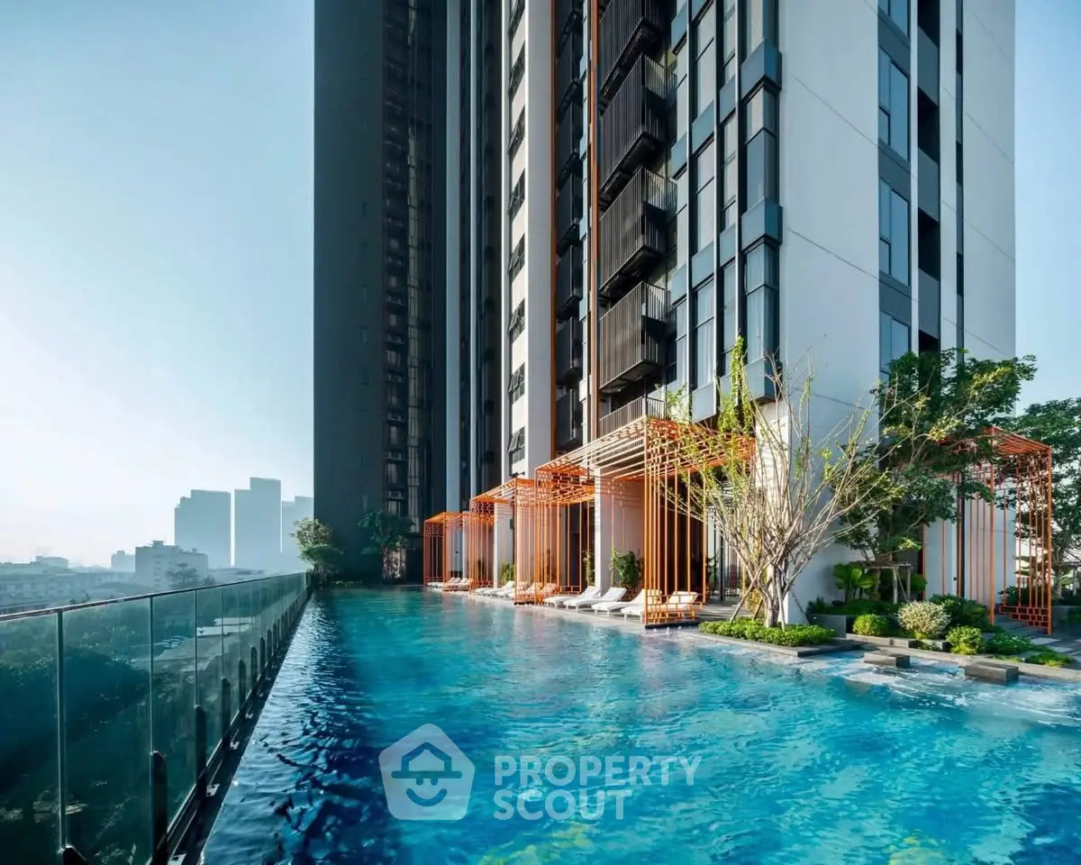 Luxurious high-rise building with stunning pool and city view