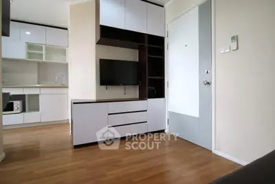 Modern apartment interior with sleek kitchen and stylish living area