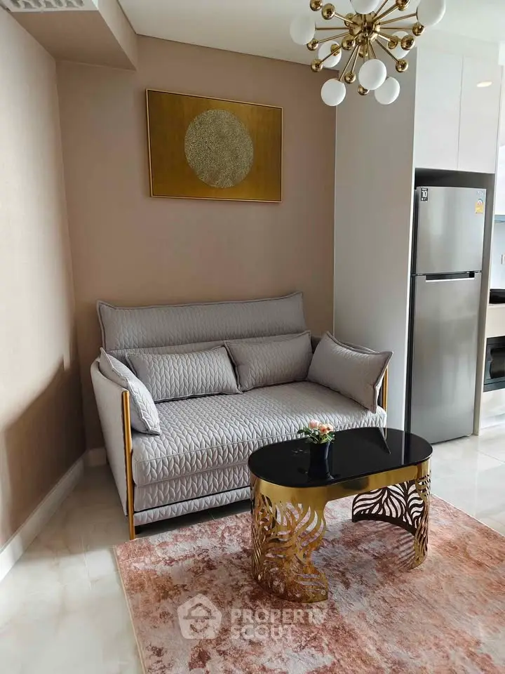 Stylish living room with modern sofa, chic coffee table, and elegant lighting