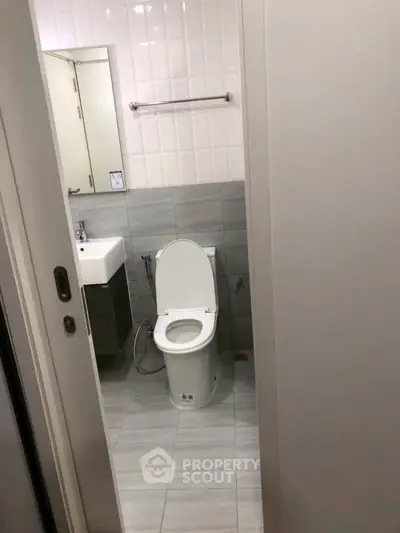 Modern bathroom with sleek design and contemporary fixtures.