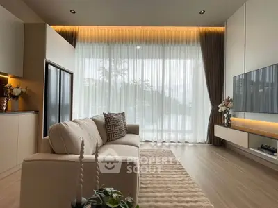 Modern living room with elegant decor and large window view