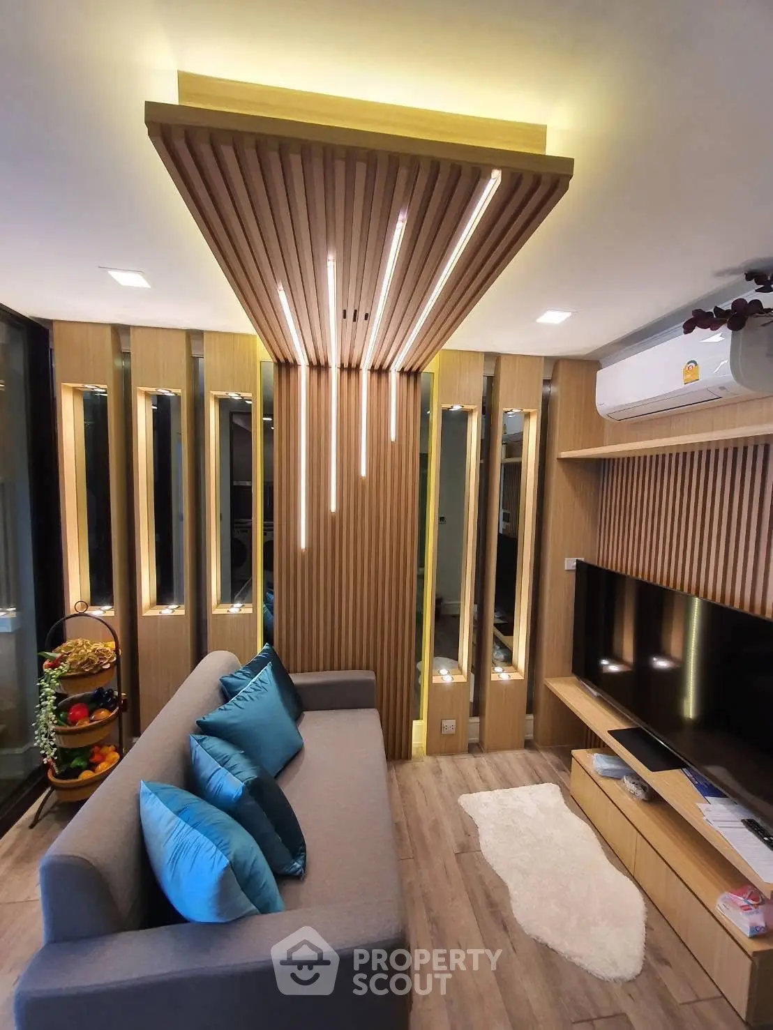 Modern living room with stylish lighting and cozy seating area