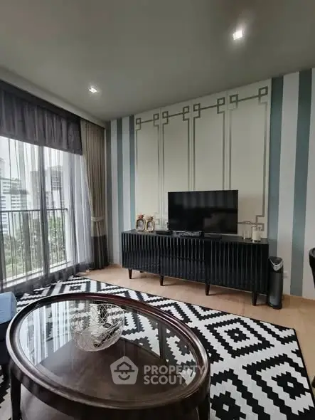 Stylish living room with modern decor and city view balcony