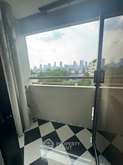 Chic balcony with stunning city skyline view, perfect for urban living enthusiasts.