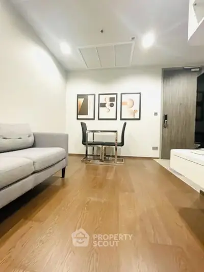 Modern living room with wooden flooring and stylish decor