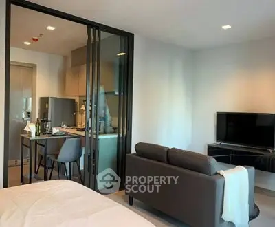 Modern studio apartment with open kitchen and cozy living area