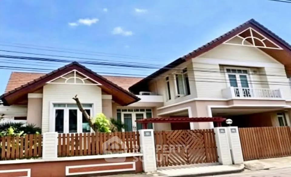 Charming suburban house with modern architecture and spacious fenced yard.