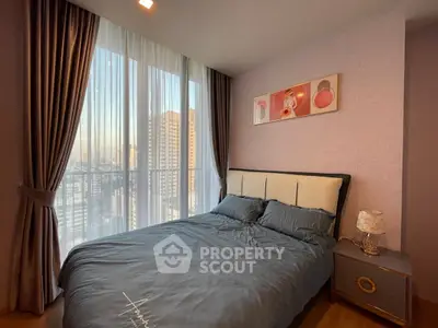 Modern bedroom with city view and elegant decor