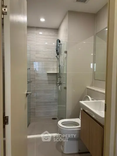 Modern bathroom with sleek shower and contemporary fixtures
