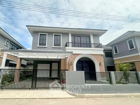 Elegant two-story house with modern design and spacious driveway