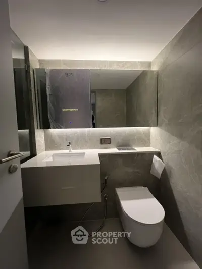 Modern bathroom with sleek design and ambient lighting